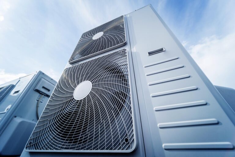Air conditioners on the roof of an industrial building.