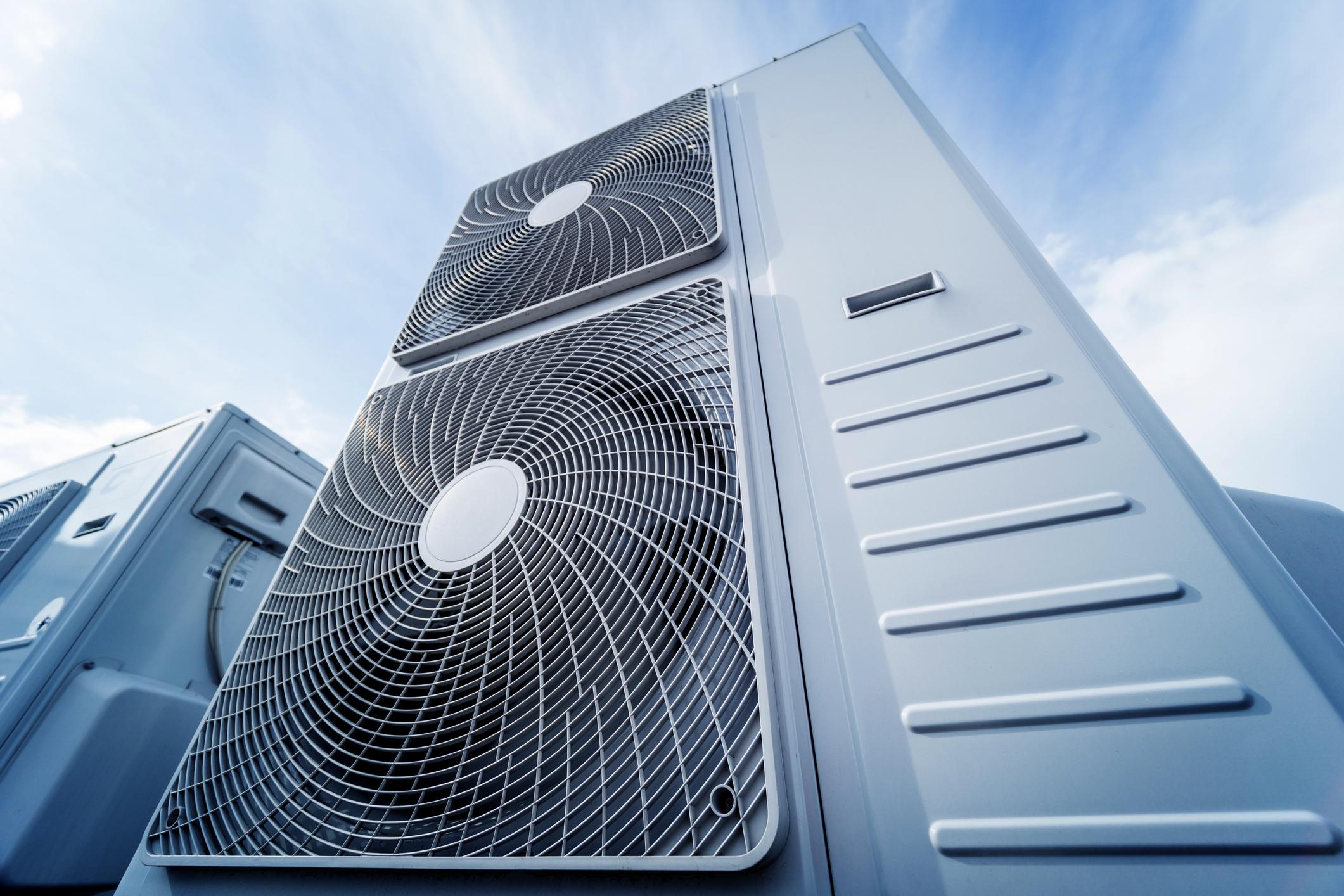 Air conditioners on the roof of an industrial building.