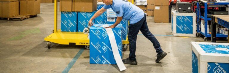labelling cartons in warehouse