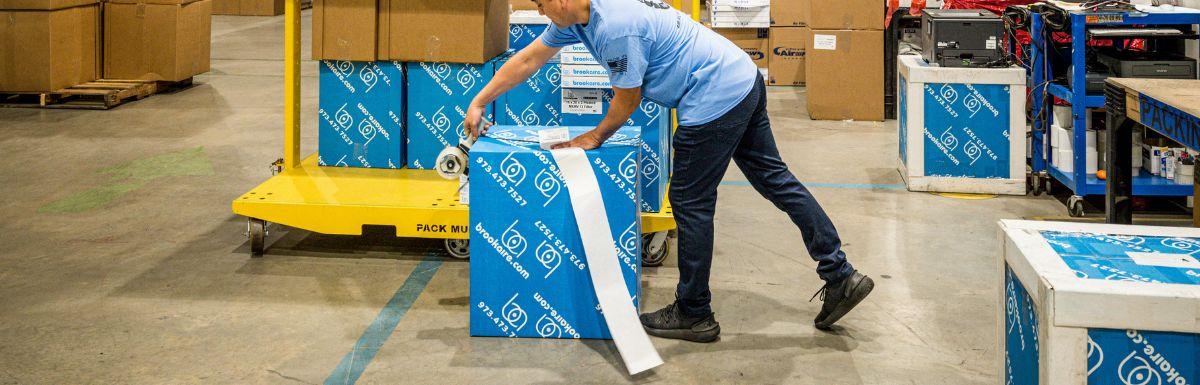 labelling cartons in warehouse